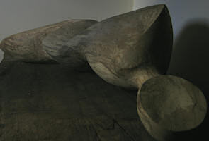 Reclining carved beech